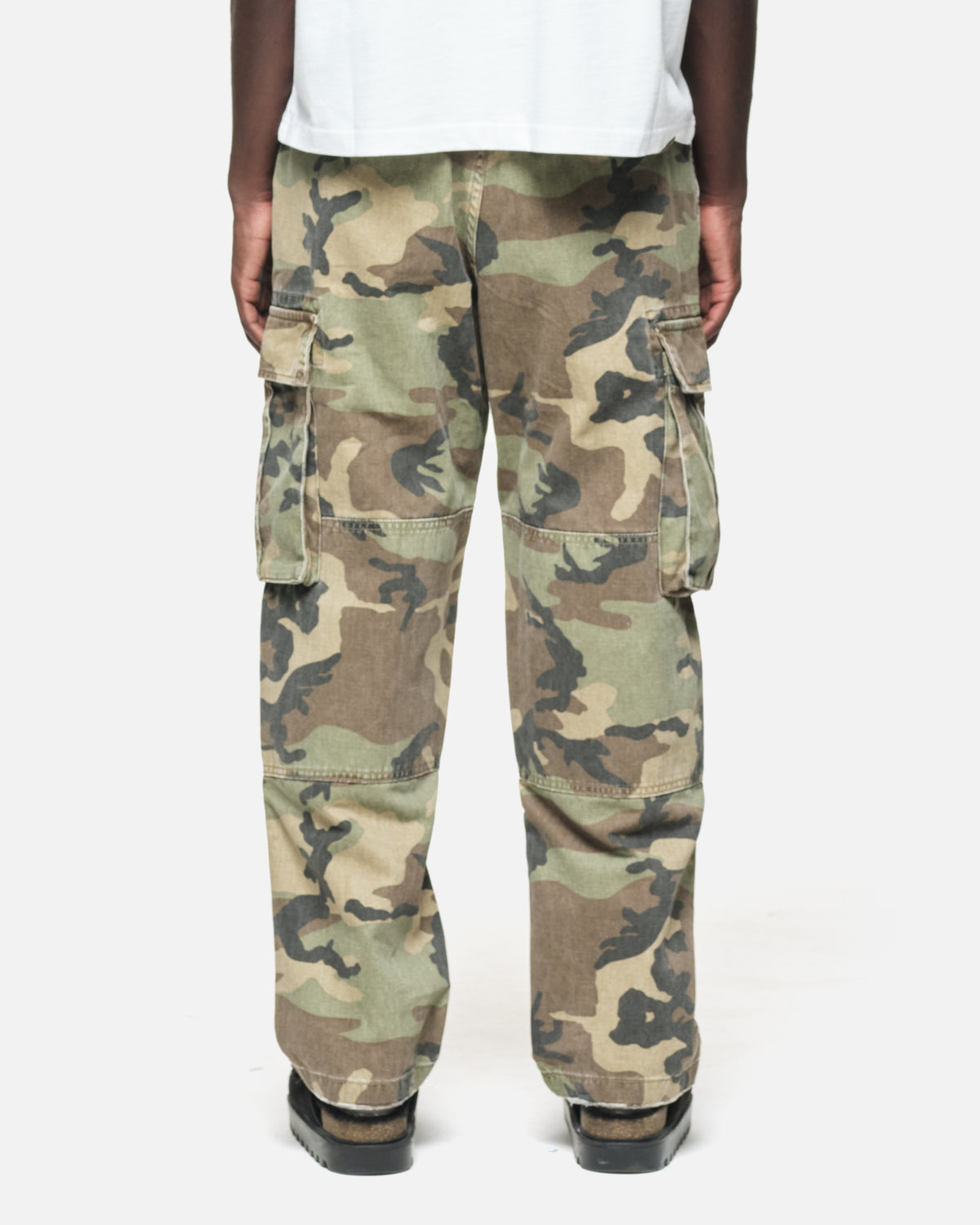 Cargo Trouser in Camo, back view on model with rear flap pockets