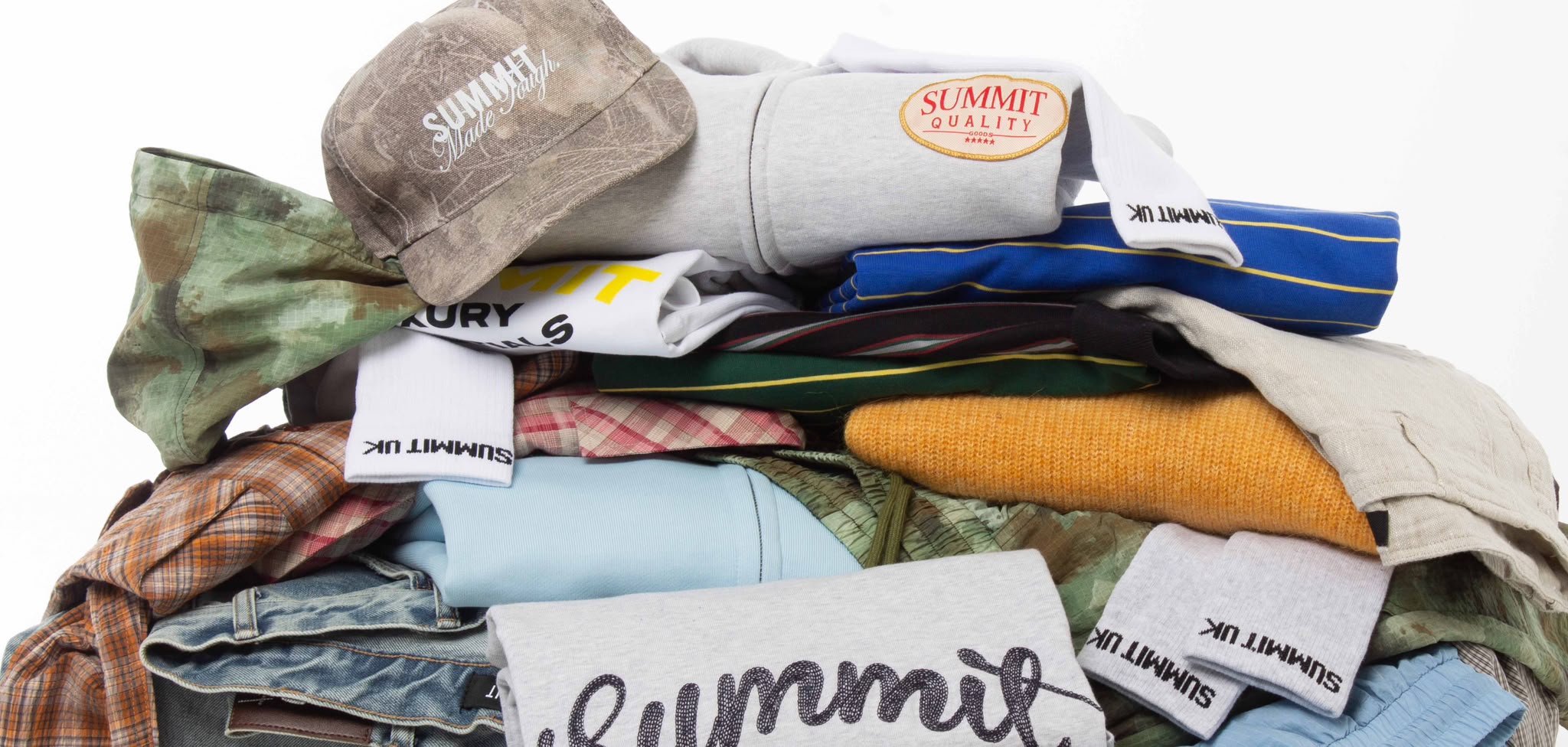 Summit summer sale — pile of Summit clothing